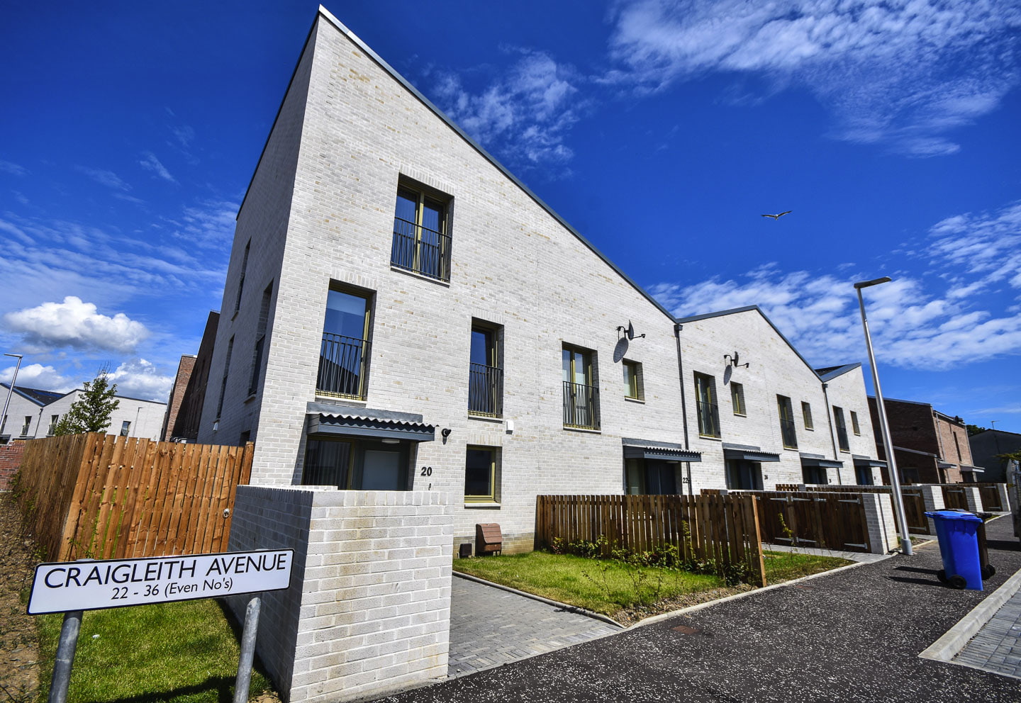 A home in Fraser Avenue on a sunny day. The street sign reads: “Craigleith Avenue, 22 to 36 (even numbers)”.