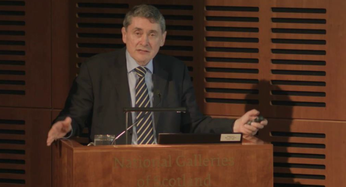 Sir Harry Burns speaks at a lecture on wellness.